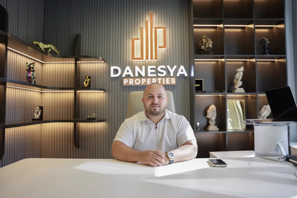 Danesya adviser at his desk